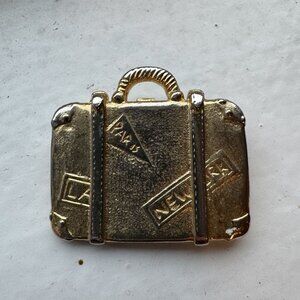 Butler and Wilson Travel Gold Pin